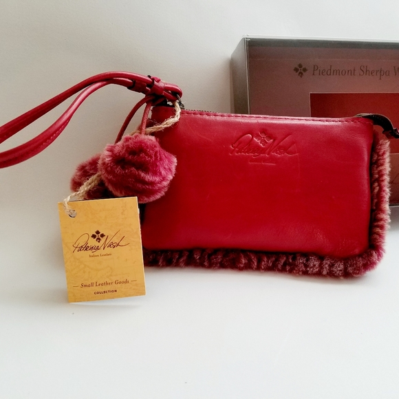 Patricia Nash Laser Cut Sherpa & Leather Wristlet In Berry Red - Picture 1 of 8
